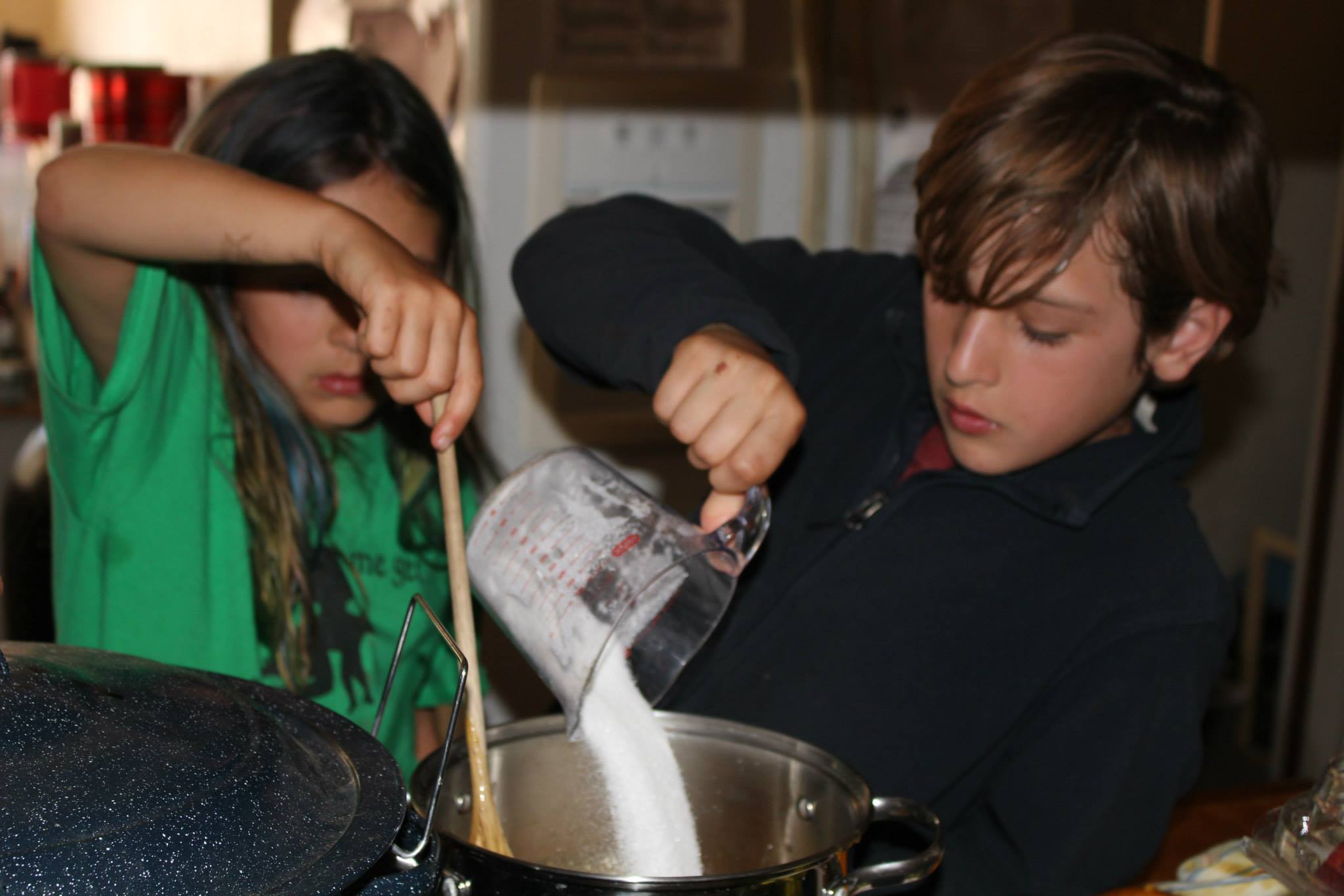 kids cooking together at kids camp 